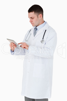 Doctor using tablet computer