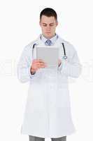 Doctor using tablet pc