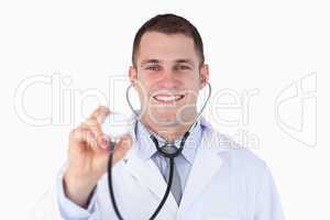 Close up of smiling doctor with his stethoscope