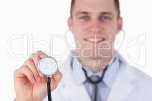 Close up of smiling doctor with stethoscope