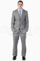 Young businessman with hands in his pocket