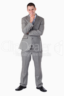Smiling and thinking businessman