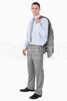 Businessman with his coat tossed over his shoulder