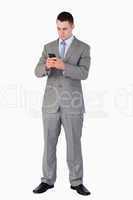 Businessman texting