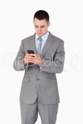 Close up of businessman texting