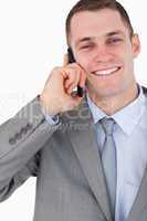 Close up of happy businessman on the phone