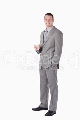 Portrait of a businessman holding a cup of coffee