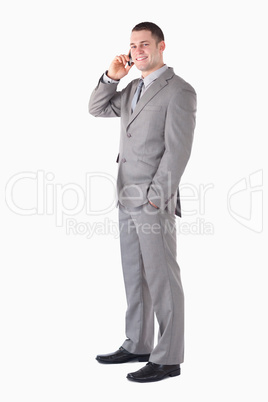Portrait of a handsome businessman making a phone call