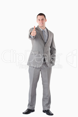 Portrait of a businessman with the thumb up