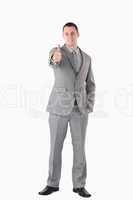 Portrait of a businessman with the thumb up