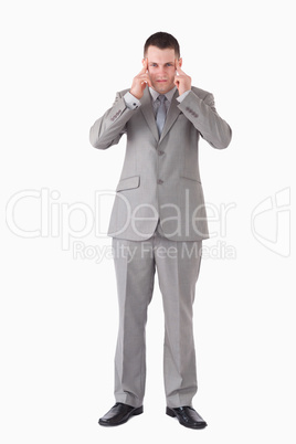 Portrait of a businessman having a headache