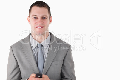 Businessman holding his cellphone
