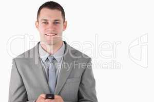 Businessman holding his cellphone