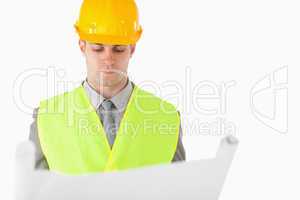 Builder looking at a plan