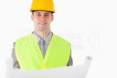 Builder holding a plan