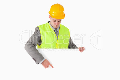 Builder pointing at something
