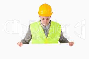 Builder looking at a blank panel