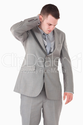 Portrait of a businessman having a neck pain