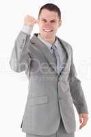 Portrait of a businessman with his fist up