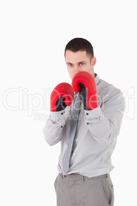Portrait of a young businessman ready to fight