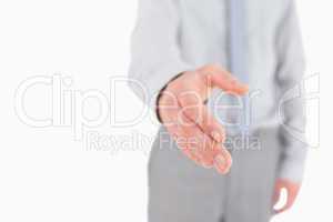 Businessman giving his hand