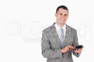 Businessman working with a calculator