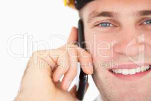 Close up of a handsome architect making a phone call