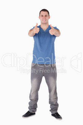 Portrait of a man with the thumbs up