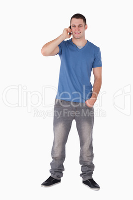 Portrait of a young man making a phone call