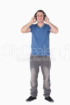 Portrait of a man listening to music
