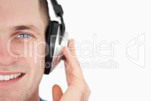 Close up of a young man listening to music