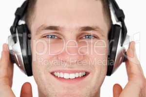Close up of a happy man listening to music