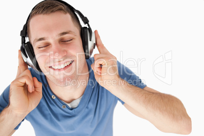 Happy man listening to music