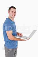 Portrait of a man using a laptop