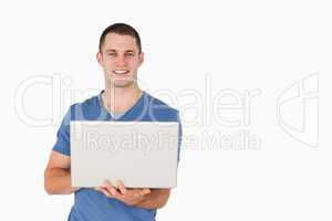 Man holding a laptop