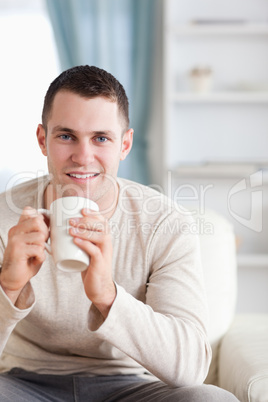 Portrait of a man having a coffee