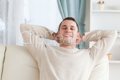 Man relaxing on a sofa