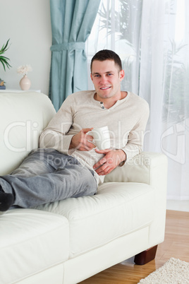 Man holding a cup of tea
