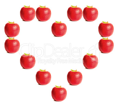 Red apples shaping a heart