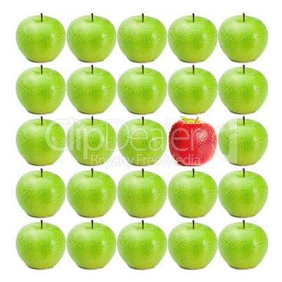 Green wet apples surrounding red apple