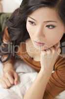 Beautiful Thoughtful Chinese Oriental Asian Woman Relaxing