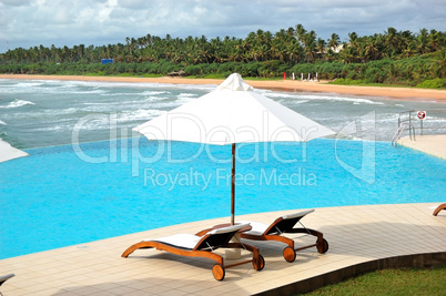 Sunbeds at the sea view swimming pool, Bentota, Sri Lanka
