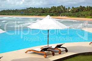 Sunbeds at the sea view swimming pool, Bentota, Sri Lanka