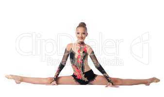 Young professional gymnast doing a splits isolated