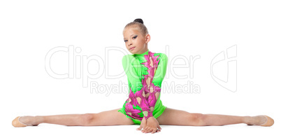 Young teenager girl sit on a splits isolated