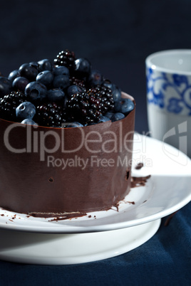 Gorgeous chocolate cake with blueberries and blackberries
