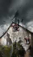 Haunted barn with ghosts flying and dark skies