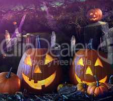 Halloween pumpkins in the grave yard