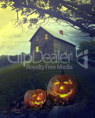 Halloween pumpkins in front of Spooky house