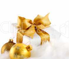 Gold ribbon gift on white